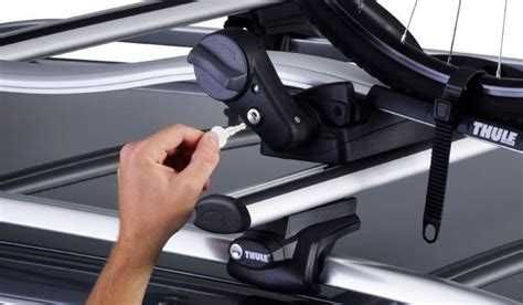 Barras de tejadilho Thule + suportes de bicicleta Nissan Qashqai 2014
