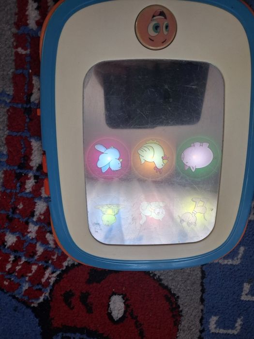 Tablet edukacyjny ( odgłosy zwierząt , piosenki)