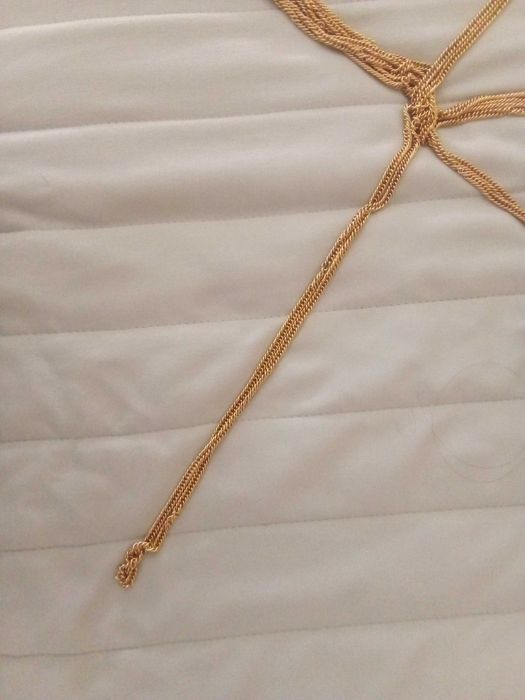 Bordão de metal dourado