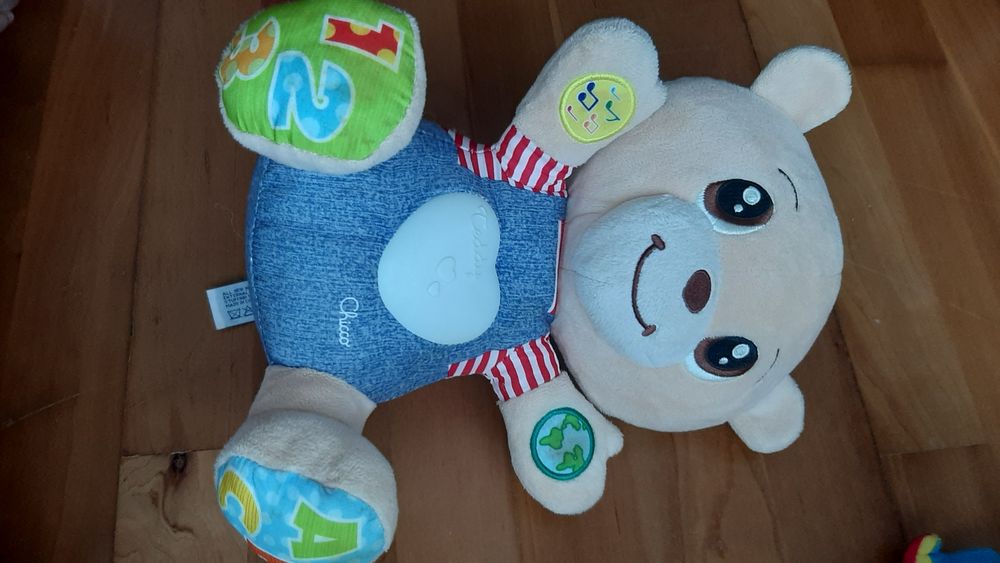 Peluche chicco interativo