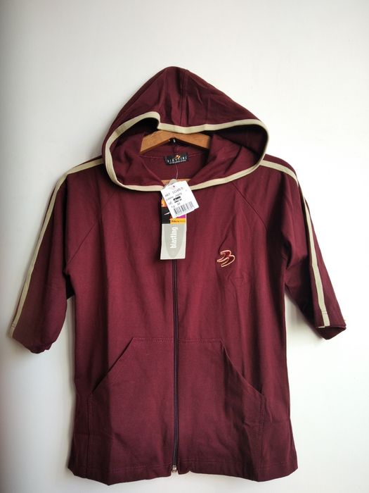 Безрукавка бордового кольору на дівчинку 10-11 років