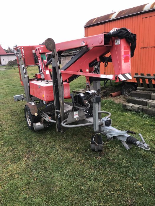 Podnosnik na przyczepie nifty lift 120 TET z moverem super stan