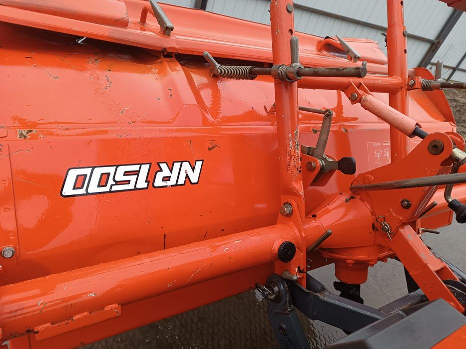 Японський мінітрактор . Трактор Кубота.