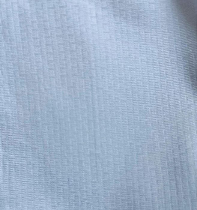 Biała elegancka koszula dla chłopca