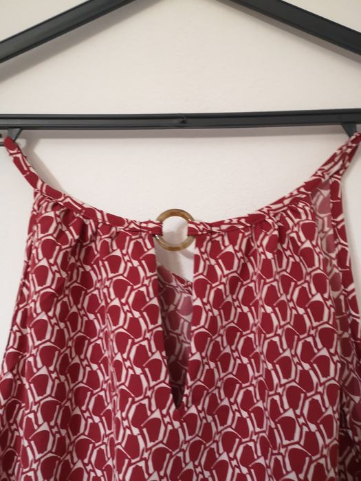 Túnica, tamanho L. Nova.