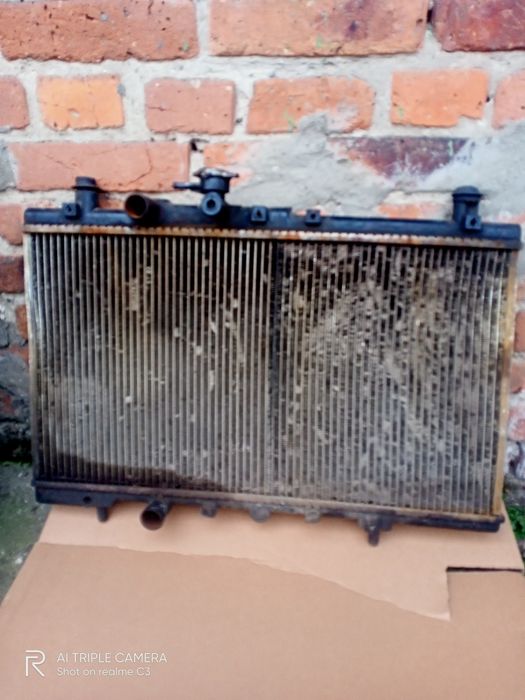 Радіатор джілі бу