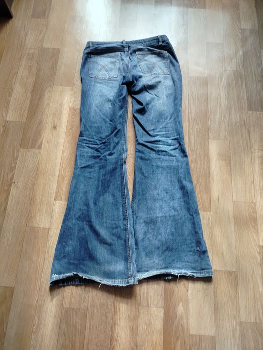 Джинсы flared клёш