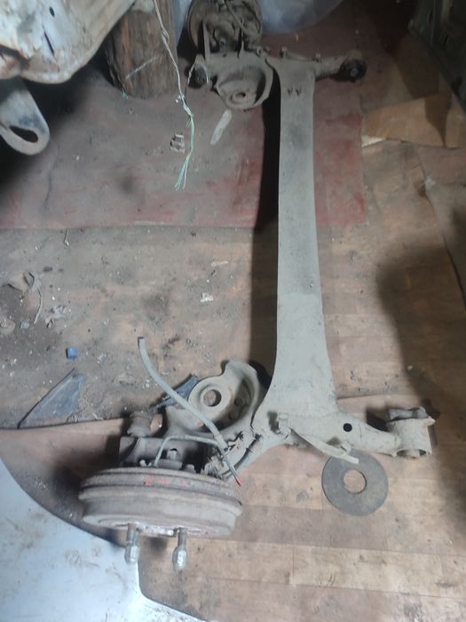 Цапфа пружина балка Geely MK 2008