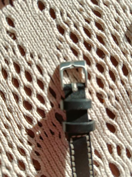 Bransoletka męska skórzana z motywem metalowym.