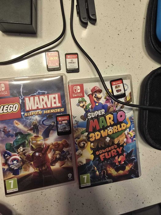 Konsola Nintendo Switch dodatki + 4gry