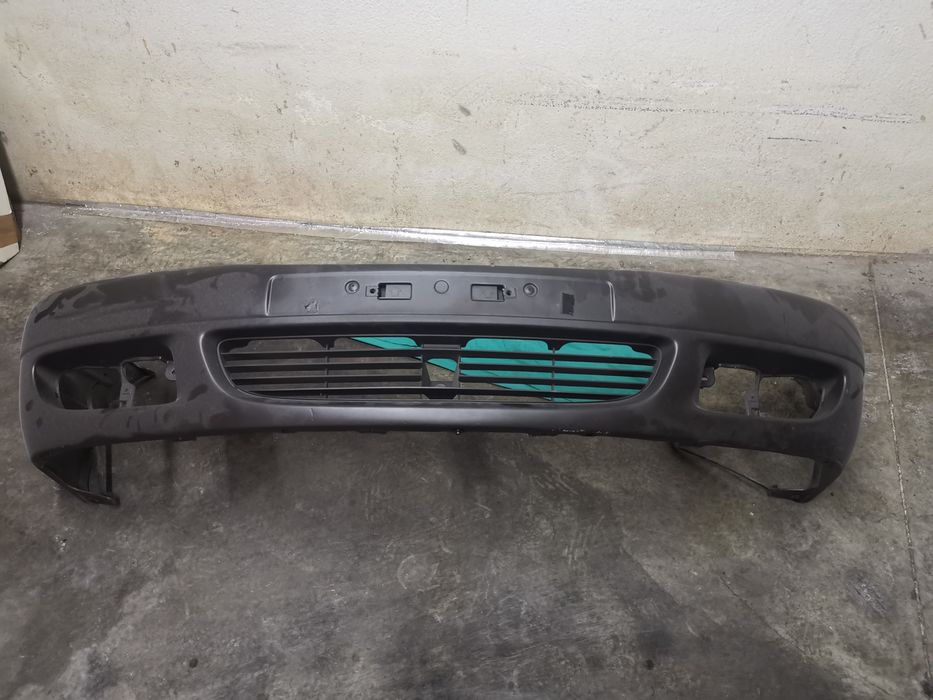 Pára choques toyota corolla e11