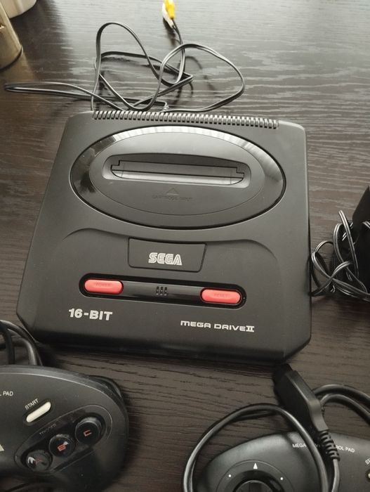 Sega Mega Drive 2 com 2 comandos e jogos mega games 1