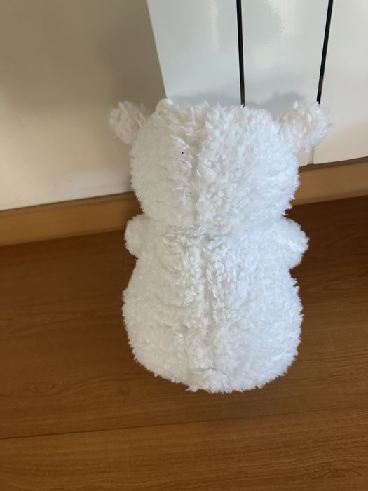 Peluche branco luminoso e com música