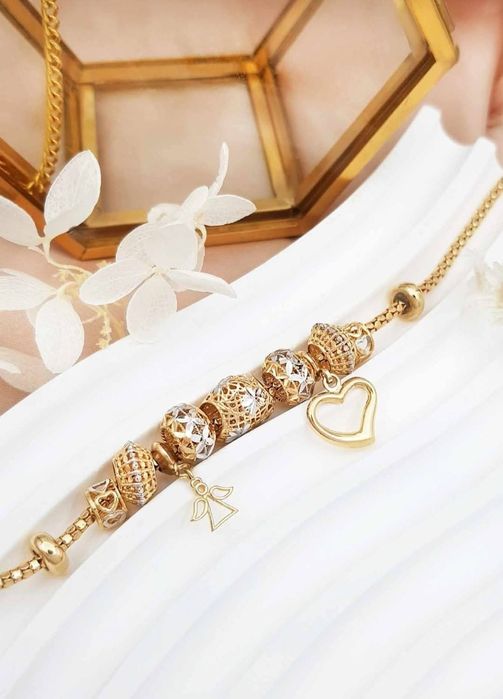 Typ Pandora. Bransoletka złota. Charmsy