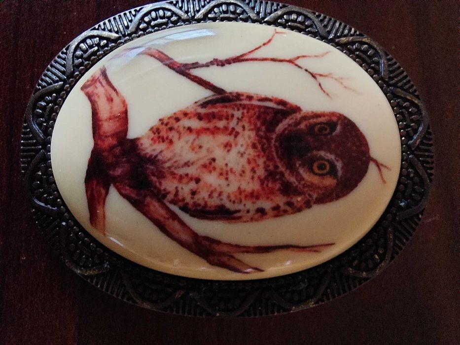 Broszka owalna spinka.