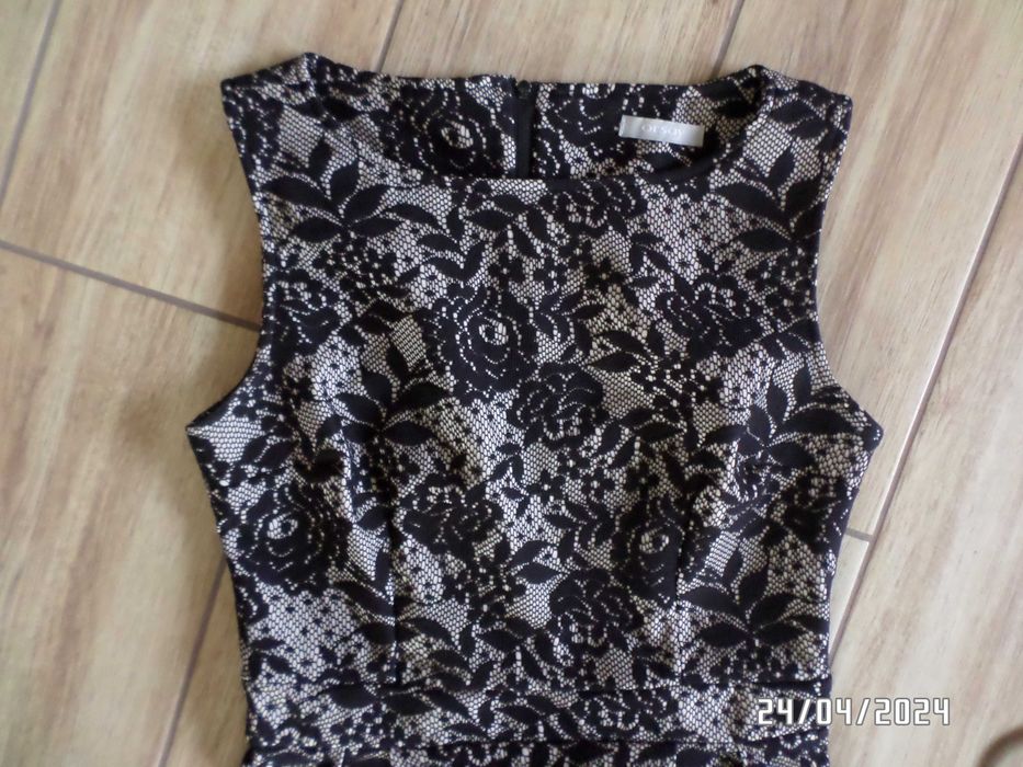 sukienka marki Orsay w kolorze czarnym z białą koronką. Rozmiar 38-S/M