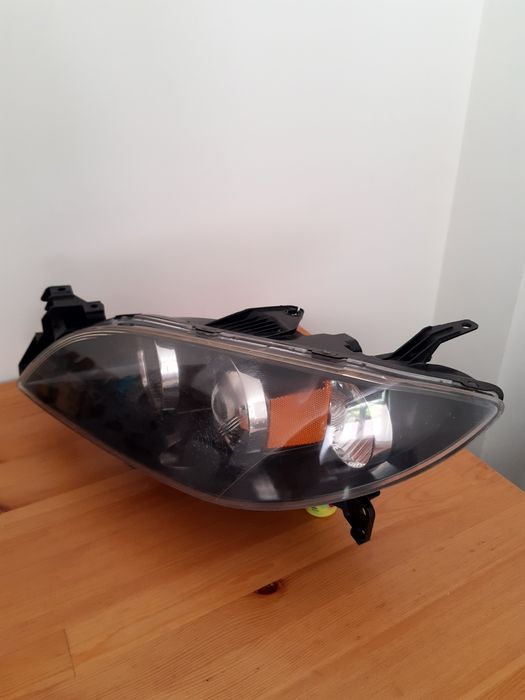 Faróis Ópticas Mazda 3 sedan 2008