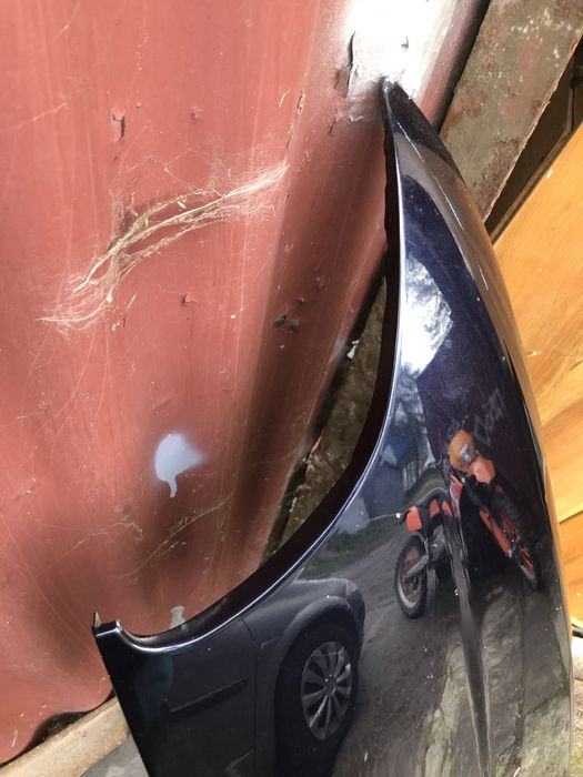 Blotnik przod lewy bmw e39 orientblau 317