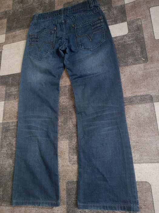 Flared jeans сині