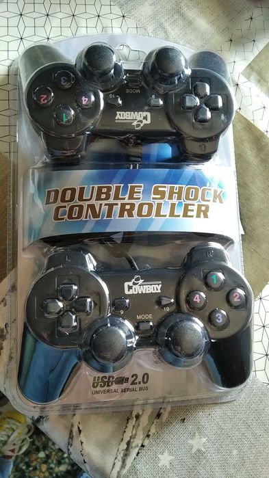 Comandos video game ainda na caixa