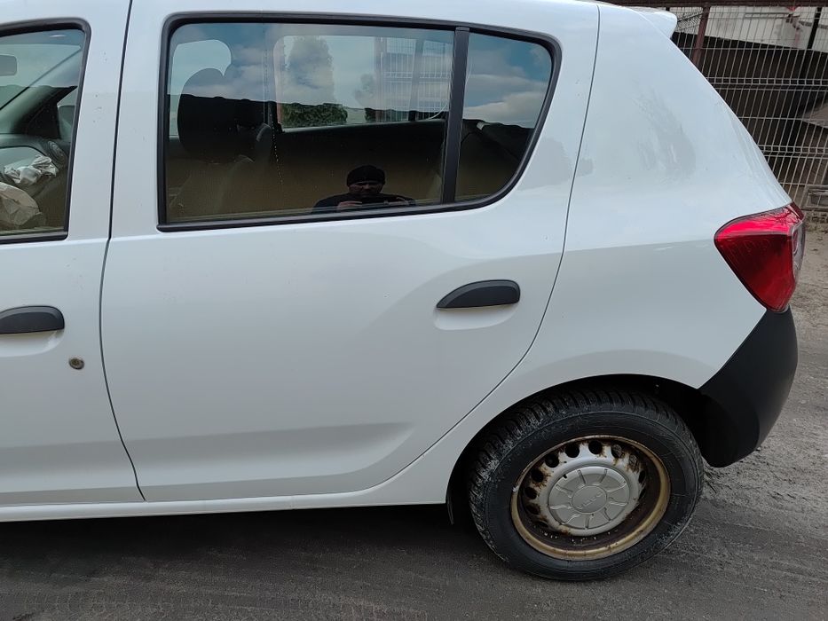 Dacia Sandero II 12- Błotnik ćwiartka Lewy tył DV369