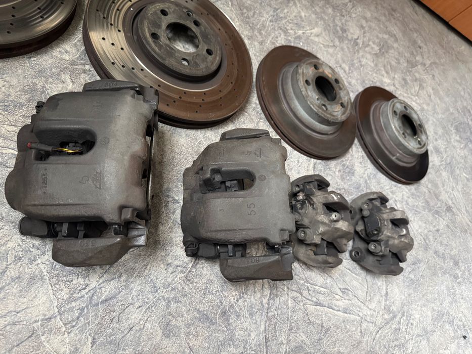 Суппорта w211 4 поршя перед и 2 поршня задние