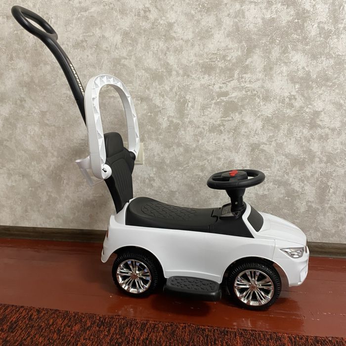 Дитяча каталка-толокар Bambi M 3503B-1 в дуже гарному стані з батьківською ручкою, світлом і музикою