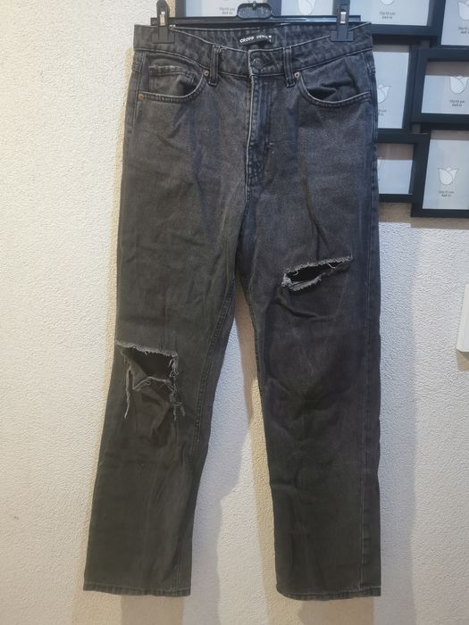 Spodnie damskie z wysokim stanem z przetarciami L