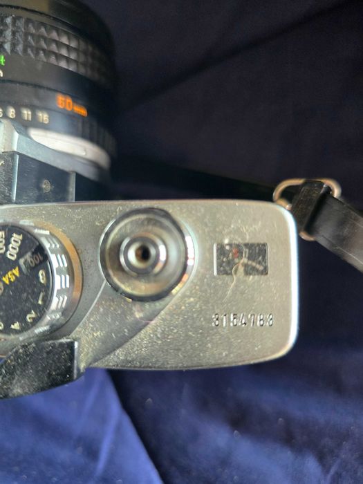 Máquina fotográfica Minolta + teleobjectiva