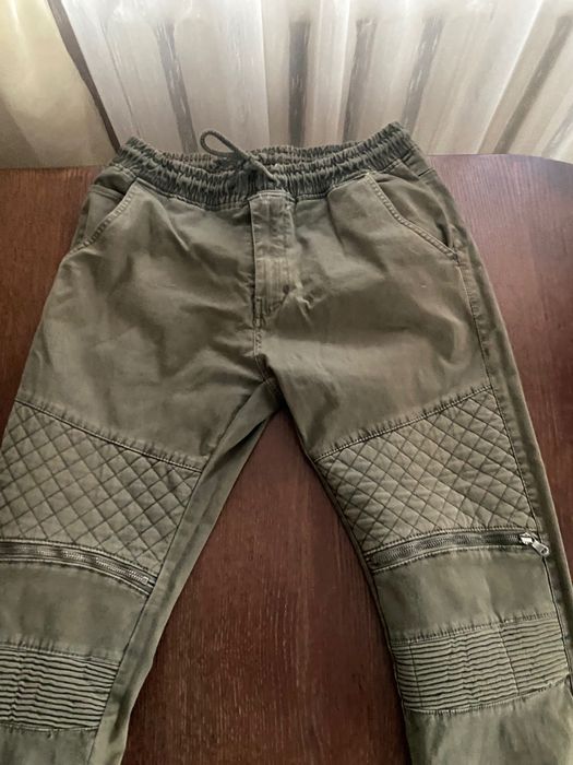 Зелені штани карго