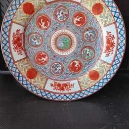 Prato raso oriental em porcelana com 26cm de diâmetro #