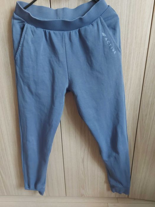 Spodnie dresowe joggery 164cm błekitno-szare