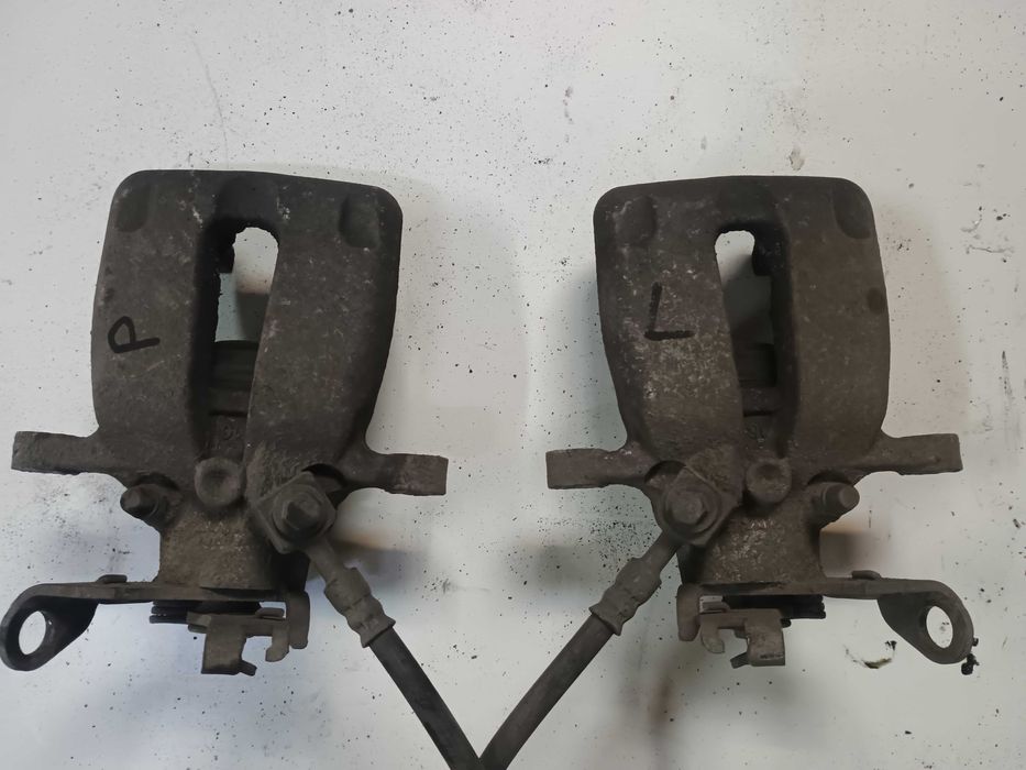 Lewy tylny zacisk hamulcowy Opel Insignia A Oryginał