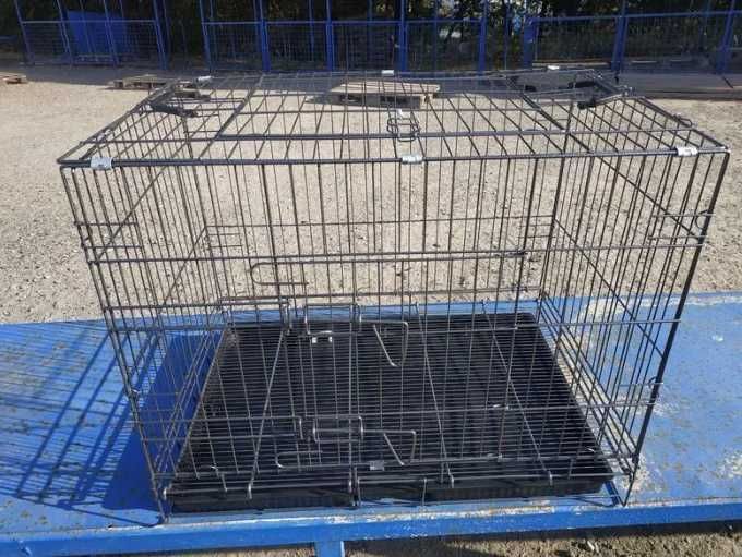 Клітка транспортер для перевезення собак