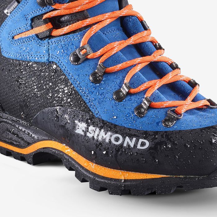 BOTAS DE ALPINISMO Couro e borracha Vibram® HOMEM AZUL