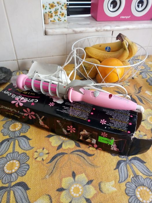 Ferro de encarrocolar o cabelo