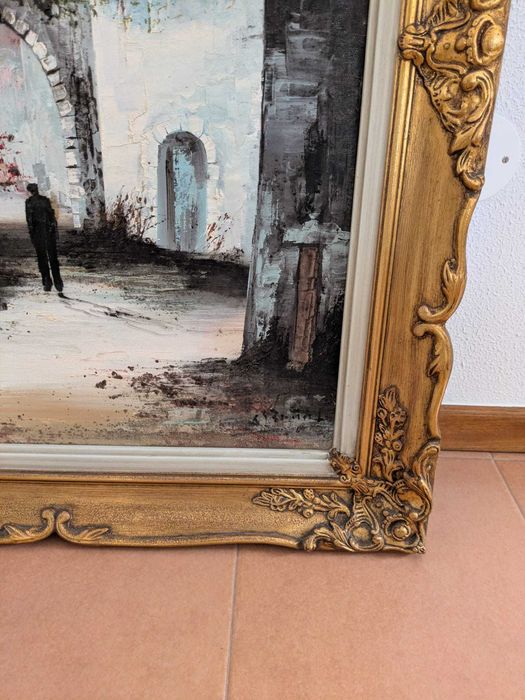 Quadro com pintura e com moldura incluída.