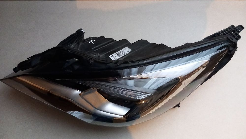 Lampa przednia lewa opel astra k