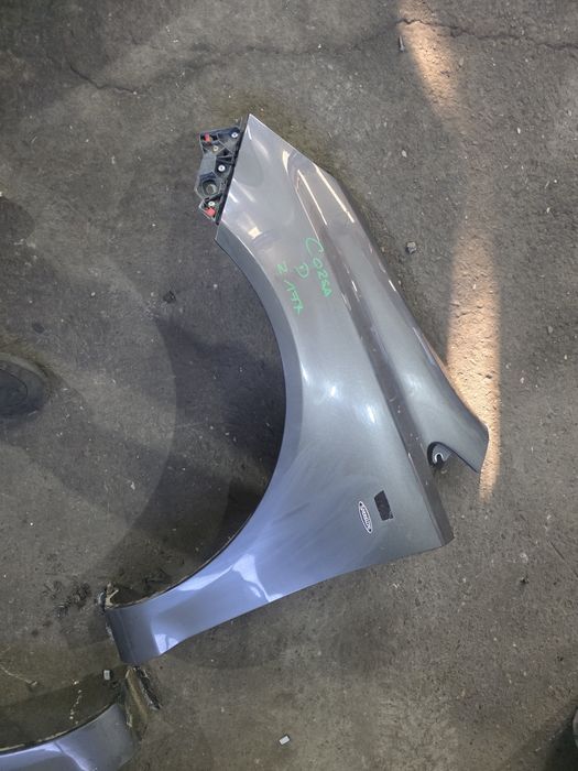 Corsa D Błotnik przód z177