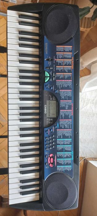 keyboard CASIO CTK-495 ze stojakiem.