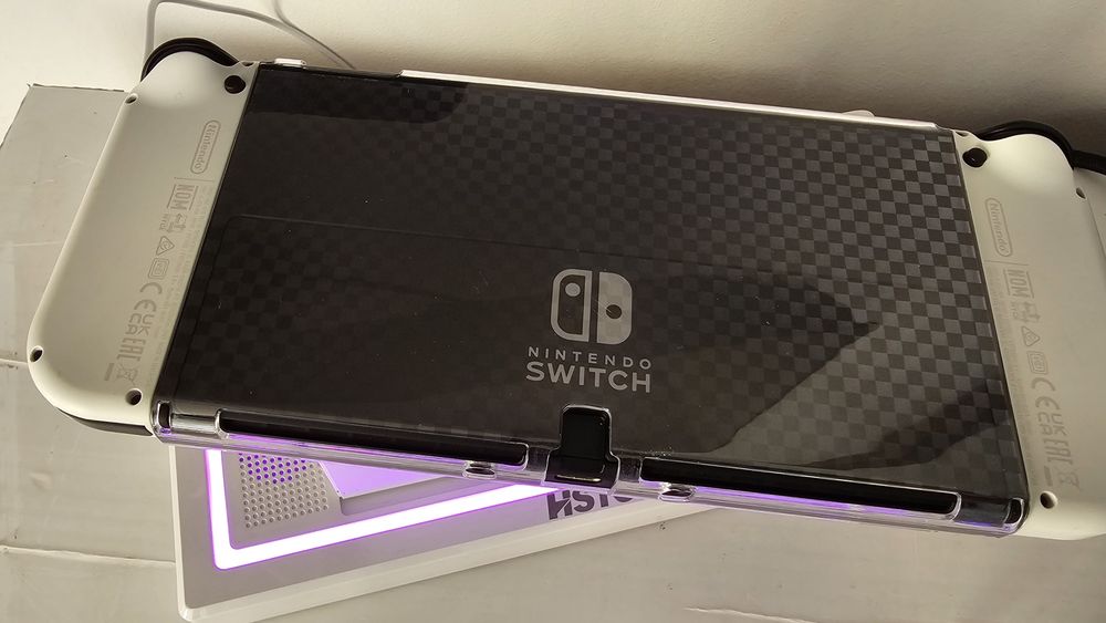 Nintendo switch Oled + 5 jogos tudo como novo