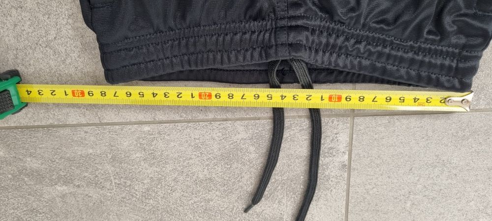 Saller spodnie pilkarskie 128 i getry Nike