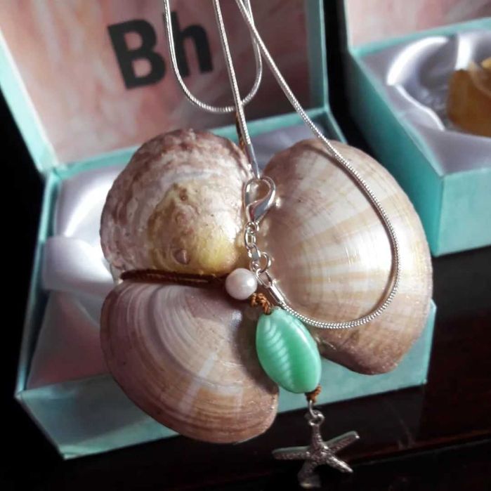 Tríades - Colar artesanal com conchas e simbolismo