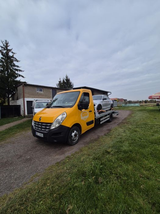 Pomoc drogowa holowanie wyciąganie z rowów transport aut