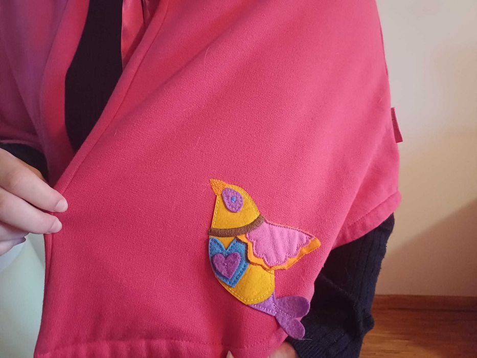 Capa de criança Agatha Ruiz de La Prada, com capuz. Preço: 13 eur
