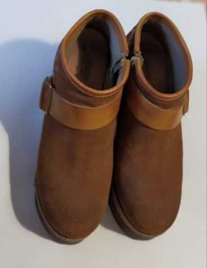 Botas em pele com plataforma