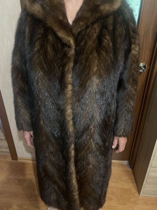 Норкова шуба шита полосами
