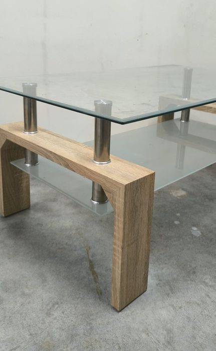 Belíssima mesa de centro Missouri Cambrian, pé em madeira e vidro.
Ler