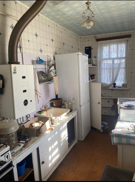 Дім в довгінцивському р-ні, батуринської
