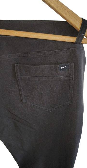 Markowe elastyczne spodnie jeans firmy Nike r 38 M czarne